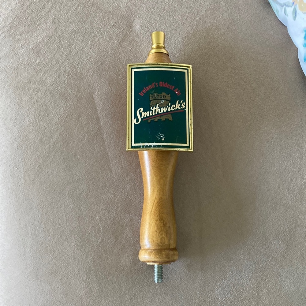 Vintage wooden Smithwick’s Ireland’s oldest ale beer tap handle